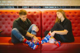 woman and man wearing national socks United Kingdom, gift for fan of travelling