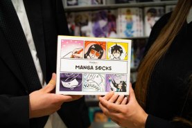 Socks in a packaging looking like a manga comics, funny socks for fan of Japanese designs