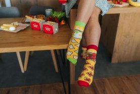 woman wearing toast socks, socks with strawberries and avocado, funny gift idea