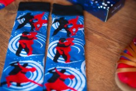 Pair of socks, black-red couple dancing against blue background, Dance With Me Socks Box for a dancer