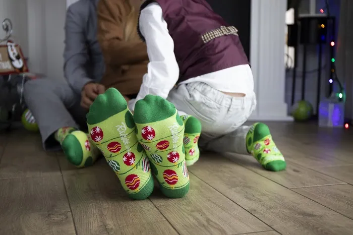 family-wearing-light-green-christmas-socks-rainbowsocks