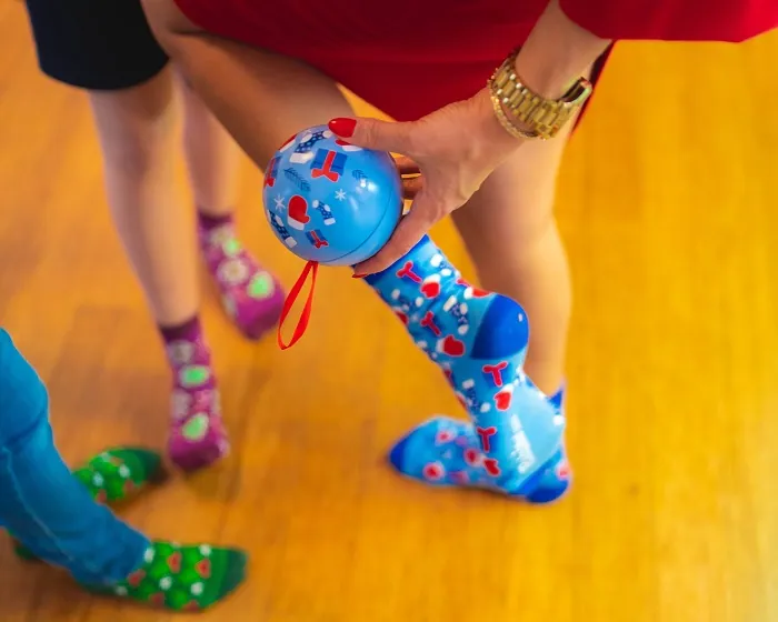 woman-wearing-blue-christmas-ball-socks-rainbowsocks
