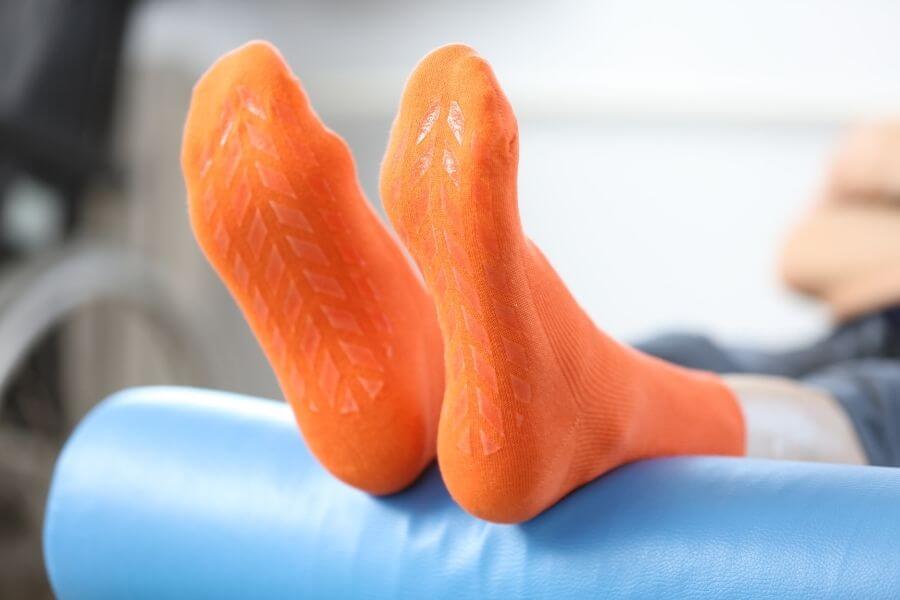 Orange socks – non-binding socks with an ABS grip. 