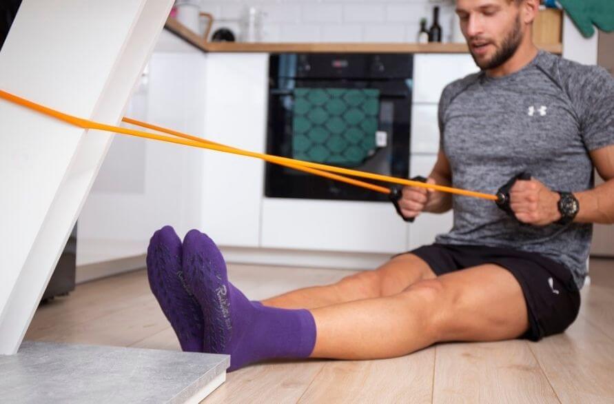 Man doing home workout in ABS cotton sport socks