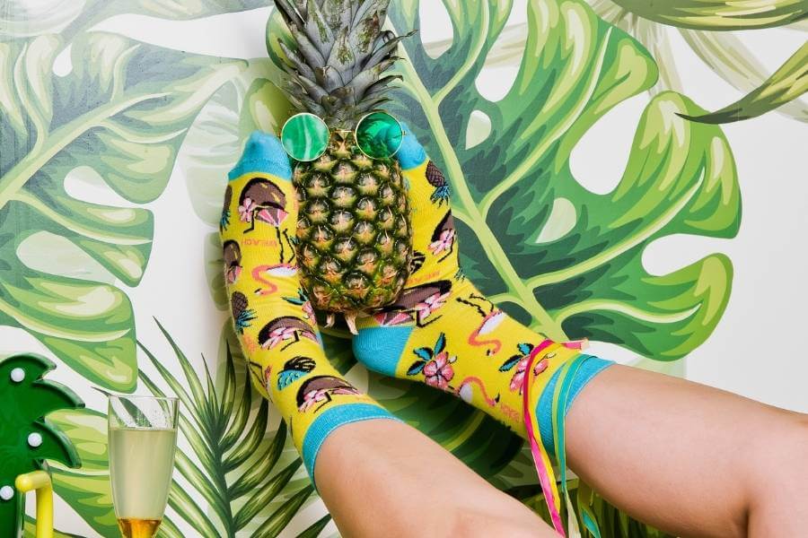 Themed Party Socks – Party Pineapple and flamingo socks.