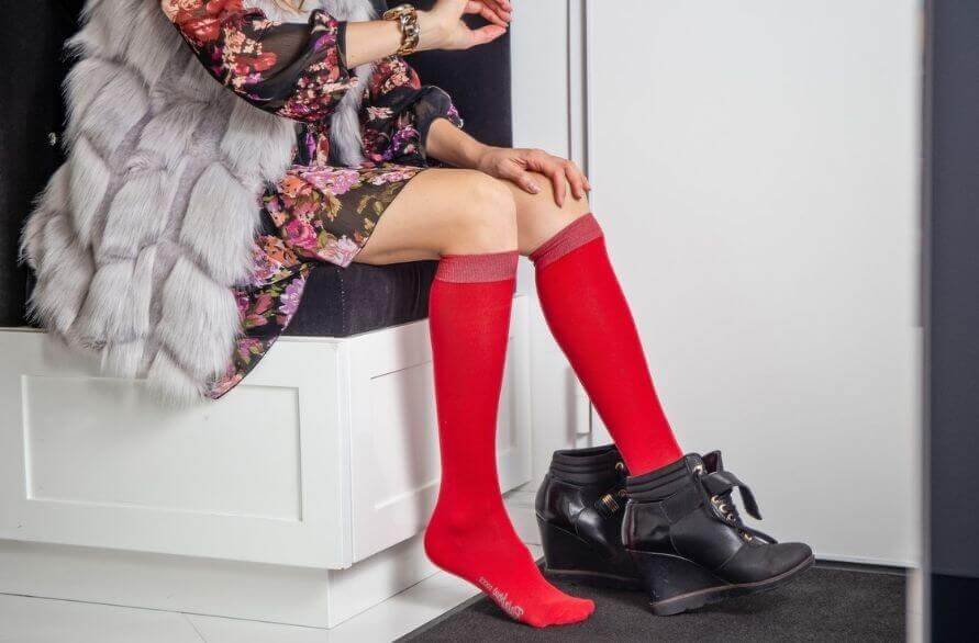 Woman wearing colourful cotton knee high socks